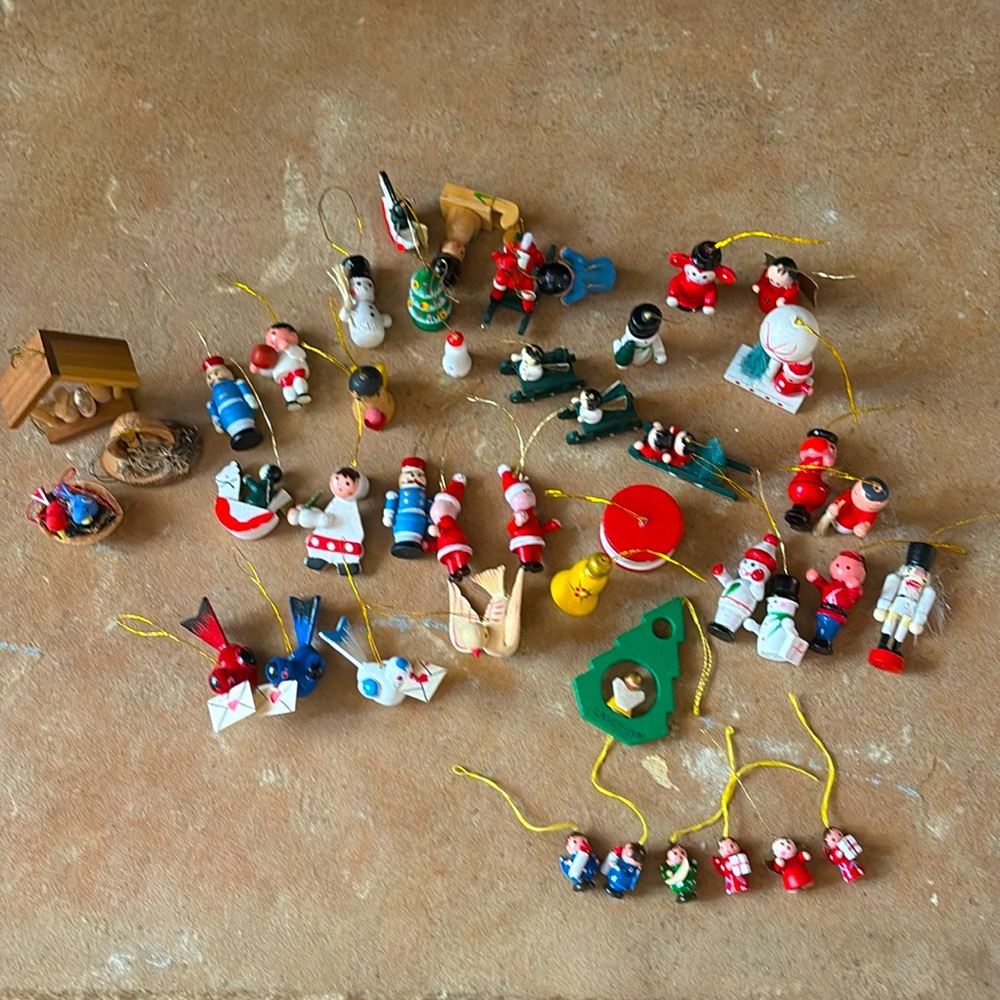 Miniature Christmas ornaments all made out of wood.